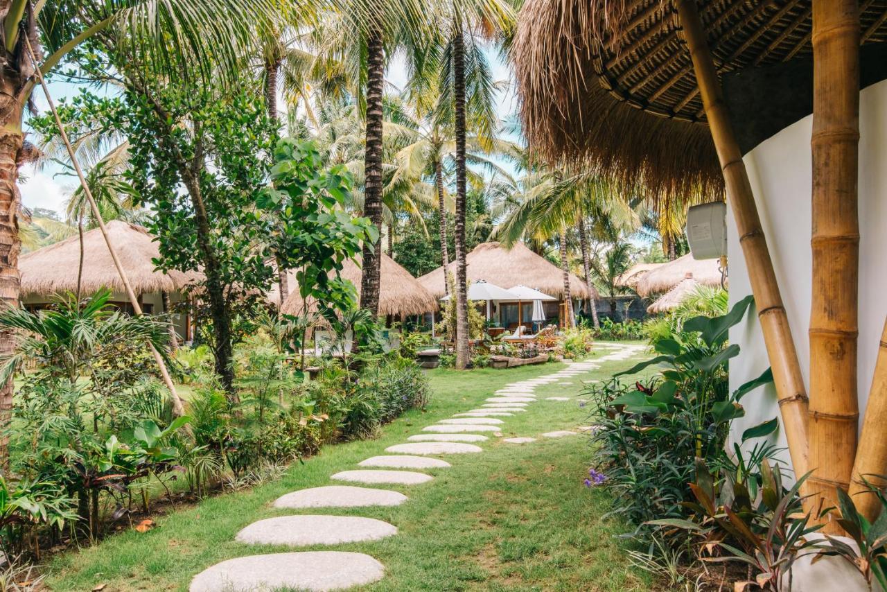 Готель Mana Eco Retreat Kuta  Екстер'єр фото
