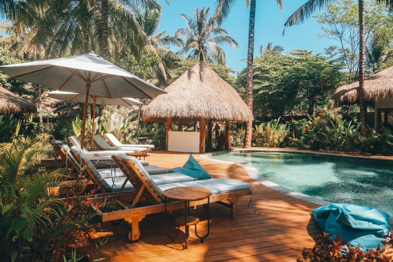 Готель Mana Eco Retreat Kuta  Екстер'єр фото