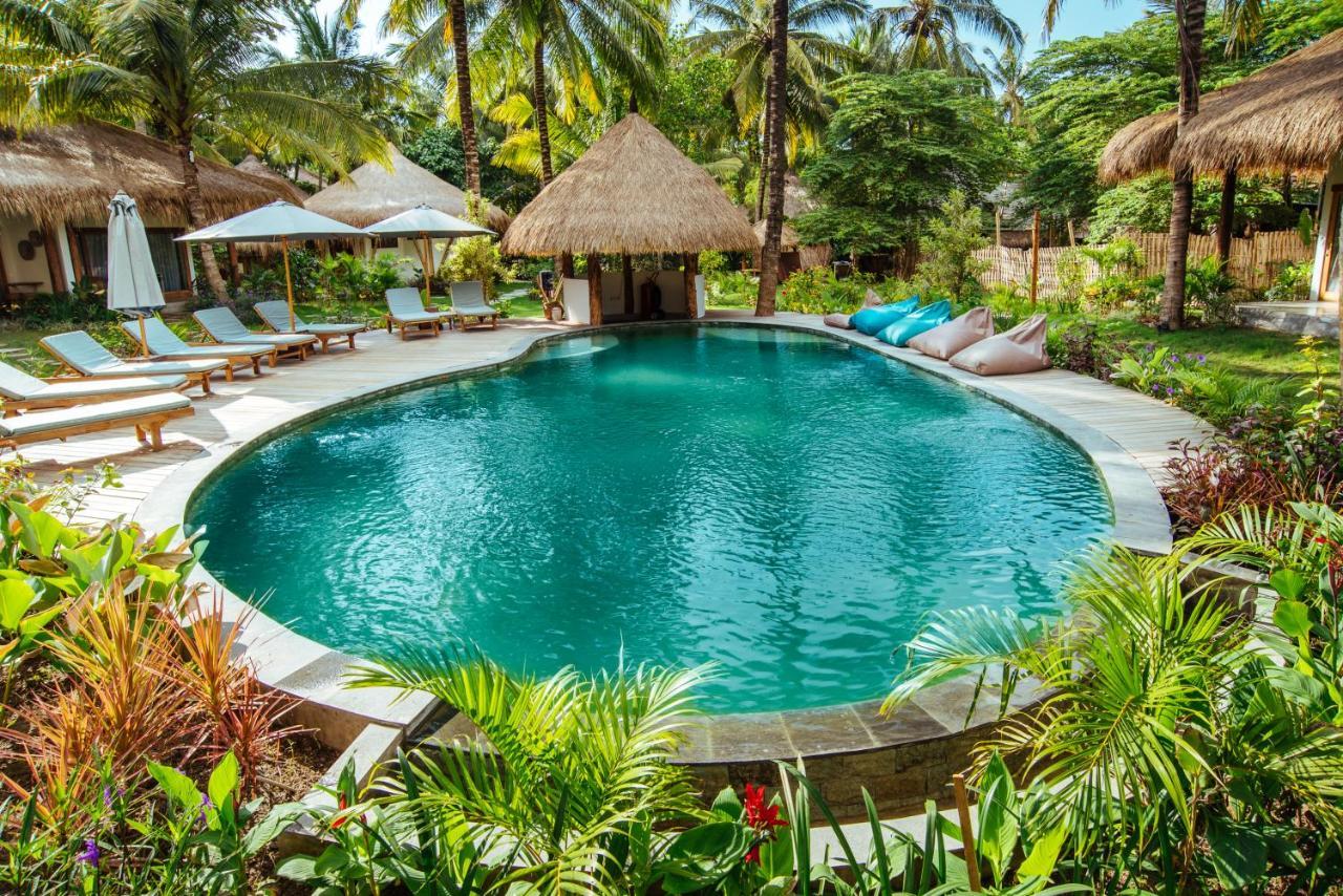 Готель Mana Eco Retreat Kuta  Екстер'єр фото