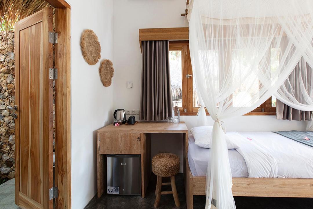 Готель Mana Eco Retreat Kuta  Екстер'єр фото
