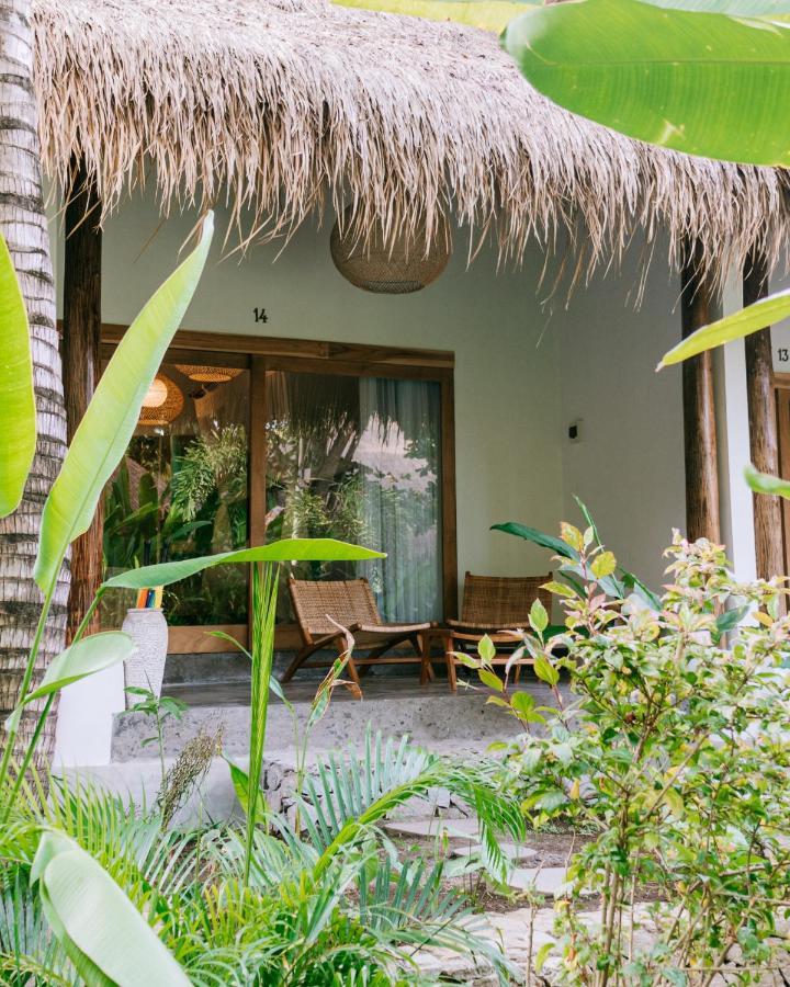 Готель Mana Eco Retreat Kuta  Екстер'єр фото