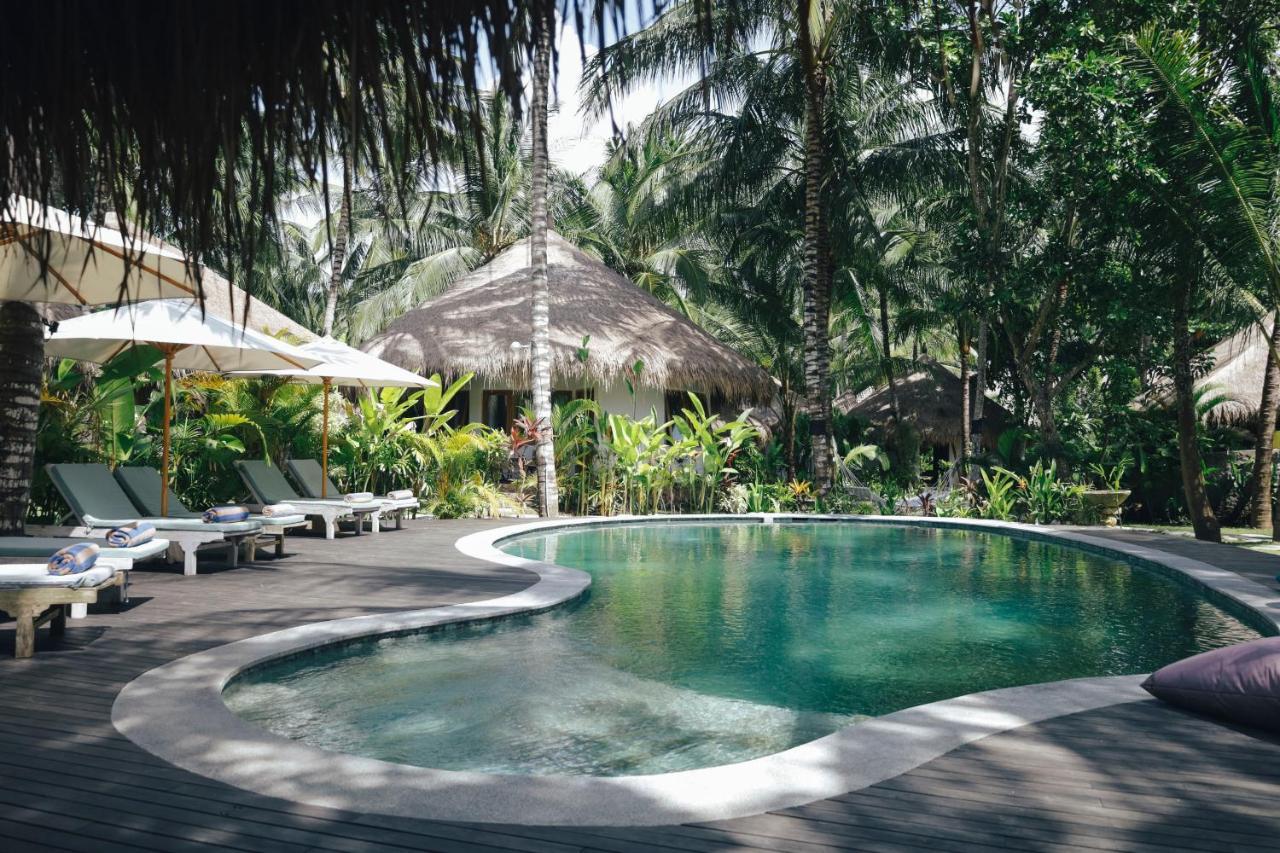 Готель Mana Eco Retreat Kuta  Екстер'єр фото