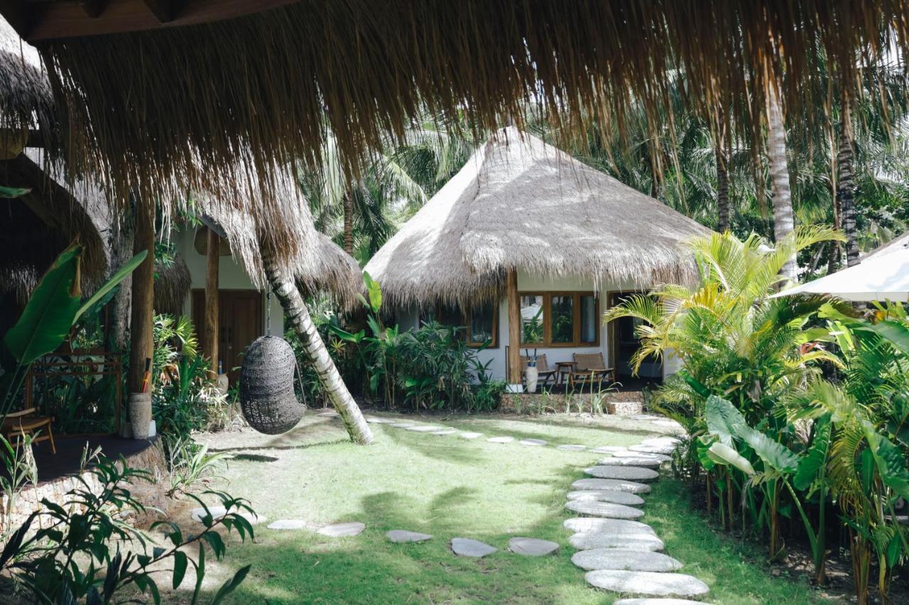 Готель Mana Eco Retreat Kuta  Екстер'єр фото