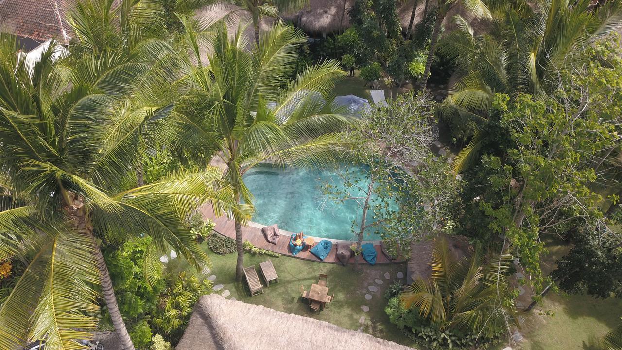 Готель Mana Eco Retreat Kuta  Екстер'єр фото