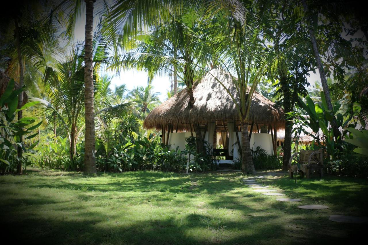 Готель Mana Eco Retreat Kuta  Екстер'єр фото